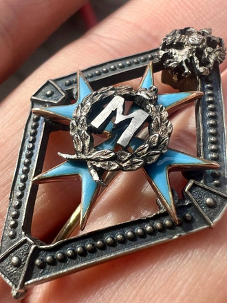 Знак высшей награды благотворительного ведомства учреждений императрицы Марии